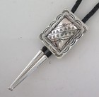 Elegant Sterling Silver Rectangular Stamped Domed Southwestern Bolo Tie