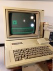     1983 Apple 2e Computer  Floppy Drives  Monitor  Mouse   All Original Manuals 