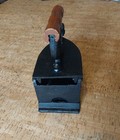Antique Cast Iron Charcoal Iron Featuring A Wooden Handle And Rooster Latch