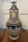 German Lidded Beer Stein Hinged Metal Lid Blue   Cream Relief Scenes German Text