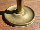 A Mid-19th Century Brass Spring-loaded Candlestick