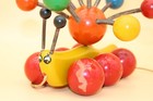 Vintage Kouvalias Wooden Banana Slug caterpillar Pull Toy 