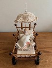 Vintage Miniature Doll Carriage With An Accompanying Bisque Doll