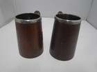 A Pair Of Vintage Carved Wooden Tankards With Silver Plated Liners
