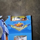 Hot Wheels Mega Garage Play Set With Two Lane Racetrack And Storage For 35 Cars