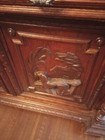 Antique German Oak Cabinet With Stained Glass Windows And Hand Carved Figures