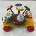 Vintage Kouvalias Wooden Pull Toy Rotating Flowers  1970s Bell Colorful Mcm