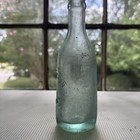 E  Sheehan Augusta  Ga  Bottle Slug Plate   Green Colored Bimal