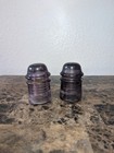 Lot Of 2 Purple Glass Insulators Am Tel And Tel Co  Chipped Broken