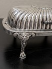 F b  Rogers Silver Co  357 Antique Hinged Rolltop Butter Dish W lion Face legs