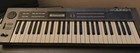 80s Roland Alpha Juno-1 Programmable Polyphonic Synthesizer  used  Works Great  
