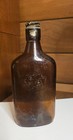 Vintage Brown Glass Liquor Bottle Embossed Label Markings With Screw Cap