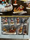 Disney Holiday Christmas Village Set  13-piece With 8 Classic Holiday Songs