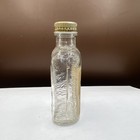 Vintage 2 Oz  Glass Bottle Old Log Cabin Has Paper Label  Cap