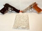Two Daisy Air Strike 240 Air Soft Pistols Orange   Clear One Blk With Ammo   works
