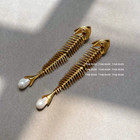Schiaparelli Gold Fish Bone Pearl Drop Earrings Jewelry