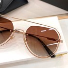 Prada Women s Oversized Square Sunglasses Gold Frame Grey Gradient Lenses