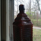 Drakes 1860 Plantation Bitters 6 Log Cabin Figural Bottle Reddish Amber Crude
