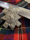 Scottish Regimental Pipers Dirk And  Black Watch Cap Badge 