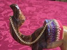 Carved Olive Wood Camel Figurine With Textile Saddle