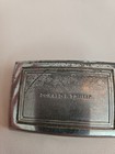 Vintage Silvertone Donald Trump Belt Buckle Stratched