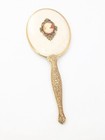 Vintage Hand Held Mirror Gold Tone Victorian Style Cameo White Fabric Backing