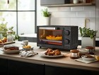 4 Slice Toaster Oven With 3 Settings  Includes Baking Rack And Pan  Black  New