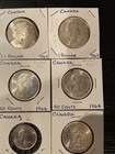 Lot Of 8 Canada Silver Collectible Coins  Dollars  50  25  10 Cent