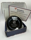 Game Used And Signed Nathan Mackinnon Puck