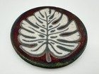 Jeremy Diller Raku Pottery Coaster 4 25    With White Monstera Leaf Signed