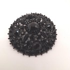 Vintage Brooch Pin Featuring Black Faceted Stones And Carved White Milk Glass