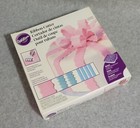 Wilton Fondant Ribbon Cutter 24-pc  Set With Bonus Storage Case Cake Decorating