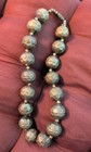 Vintage Mid Century Brass Round Textured Metal 8in Bead Strand