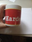 1999 Hardee s Coffee Mug yellow Star red Background new