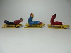 Vintage Barclay Manoil Lead Toy Figurines 3 People On Sleds  Nice Low Shipping