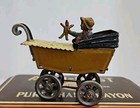 Girl In Yellow Carriage With Toys Stamped Germany Tin Penny Toy Meier