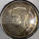 1952 Canada Silver Dollar  1 Canadian Canoe Coin - Bu Uncirculated Toned