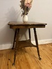 Victorian Hand Carved Tiger Oak Parlor Table Brass glass Crystal Ball Feet 1900s