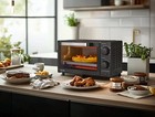 4 Slice Toaster Oven With 3 Settings  Includes Baking Rack And Pan  Black  New