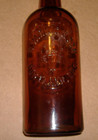Embossed H varwig   Son Portland Oregon Western Whiskey Blob Top Amber Bottle Or