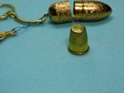 Vintage collectible Made In Austria Brass Thimble   Holder Keychain