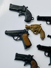 Vintage Gumball Machine Gun Charms-lot Of 7 Plastic  Rubber 1 3 4  Hong Kong