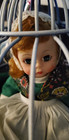 Haunted Vessel Doll In Cage Eyes Follow Claims Witch Trial Victimhood Possessed