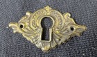 Antique Matching Set Of 8 Stamped Brass Key Escutcheon Keyhole Covers