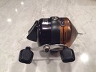 Zebco 600 Spincast Reel Front Cover Copper bronze- Reel Is In Mint Condition