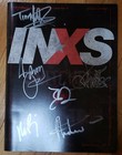   lower Price    - Inxs -   signed  Switched Tour Book   mint Condition 
