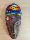 Two Vintage Huichol Beaded Masks On Ceramic Pottery