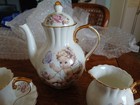 Vintage Miniature Cherub Floral Porcelain Tea Set  9-piece Service  Gold Trim