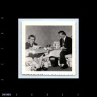 Old Vintage Square Photo Man Woman Couple Duo Opening Presents Couch Sofa