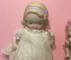 Two Adorable All Bisque Dolls Nippon Dolls Drayton Style Googly   Molded Dress
